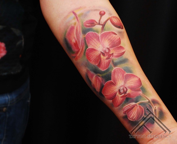 Realism style colored forearm tattoo of beautiful flowers
