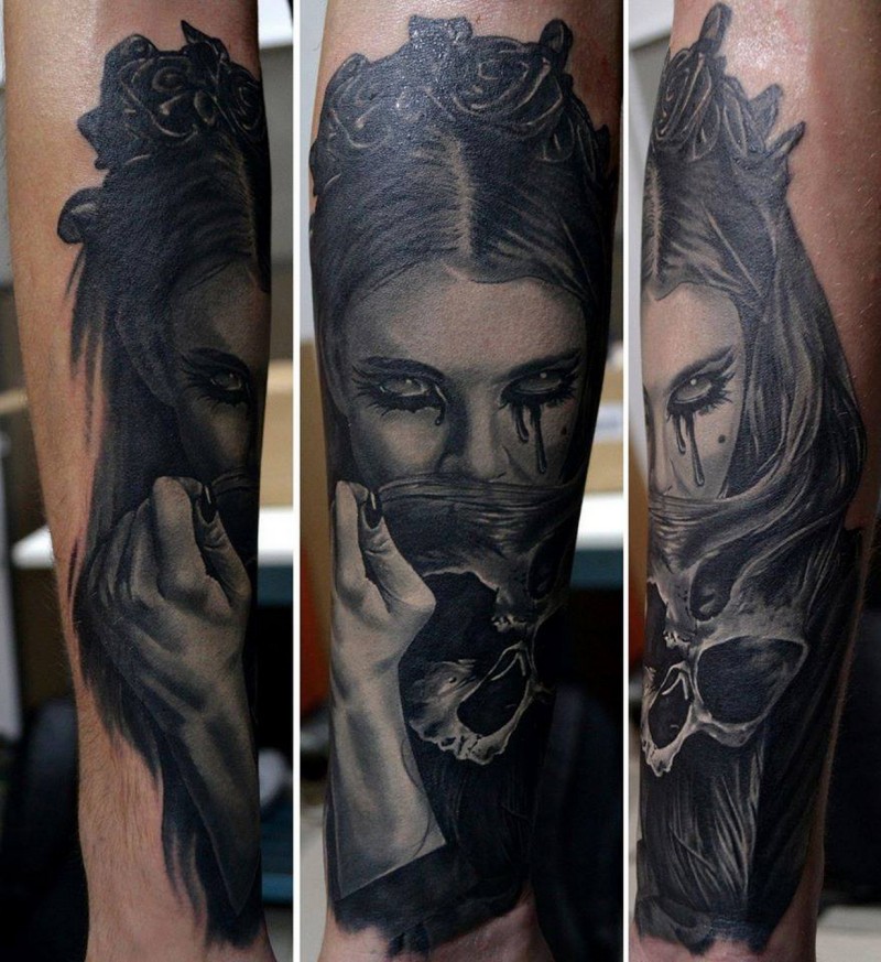 Realism style colored forearm tattoo of crying woman with skull