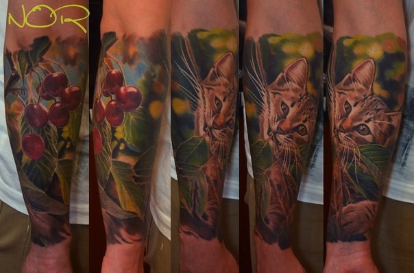 Realism style colored forearm tattoo of wild cat with cherries