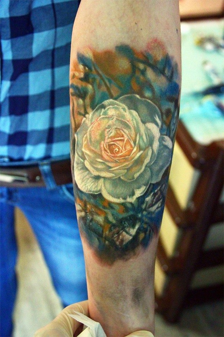 Realism style colored forearm tattoo of beautiful white rose