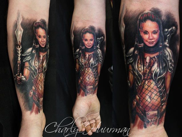 Realism style colored forearm tattoo of woman warrior