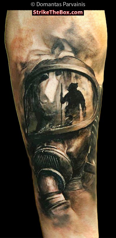 Realism style colored forearm tattoo of human with gas mask