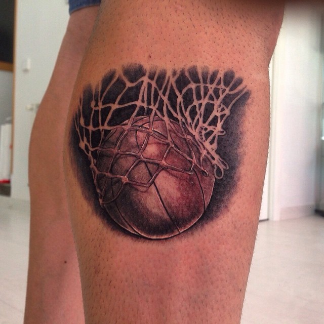 Realism style colored leg tattoo of basketball game