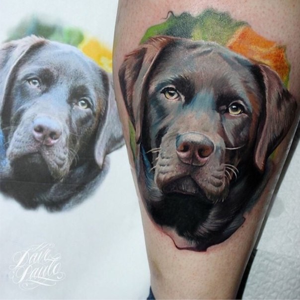 Realism style colored leg tattoo of cute dog
