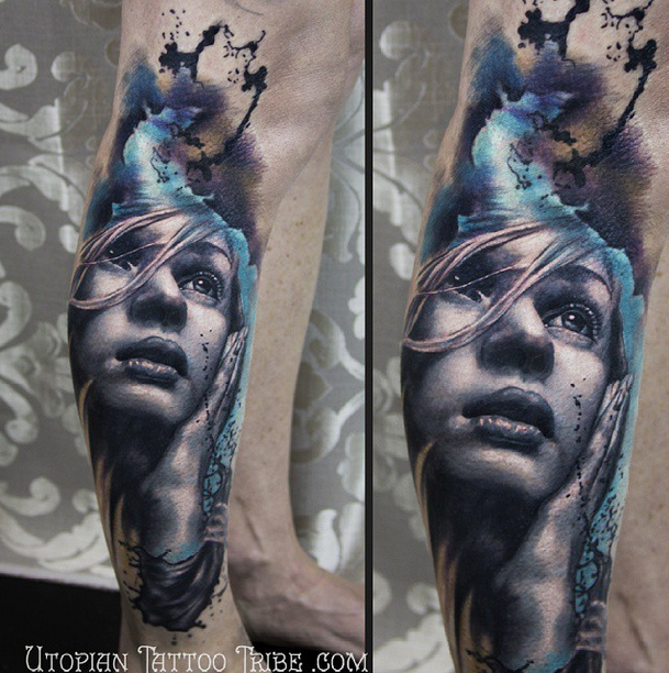 Realism style colored leg tattoo of woman portrait
