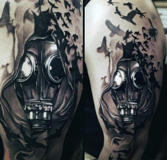 Realism style colored shoulder tattoo of man with gas mask