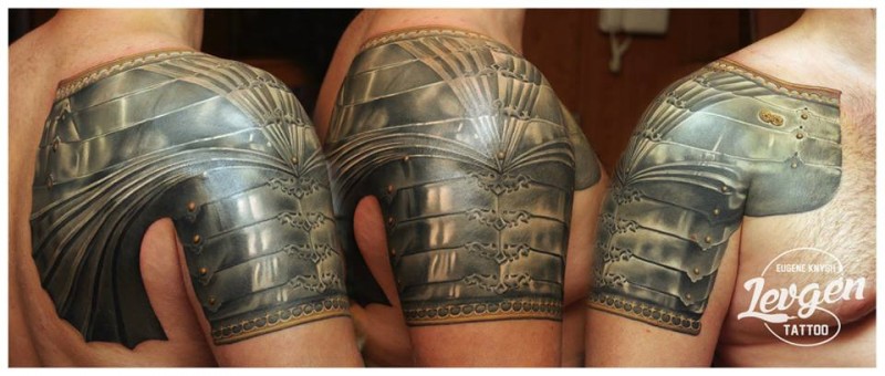 Realism style colored shoulder tattoo of medieval armor
