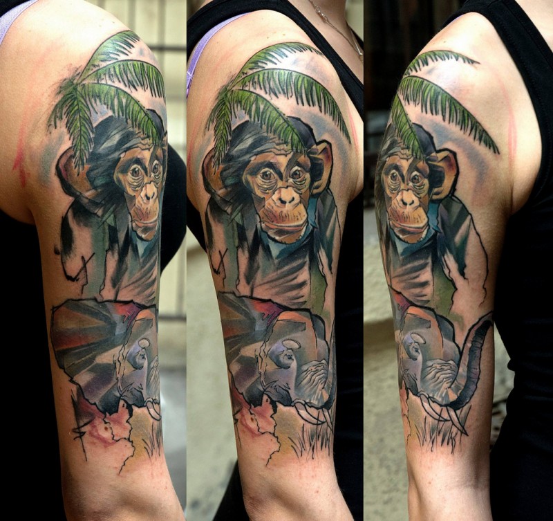 Realism style colored shoulder tattoo of monkey with palm tree and elephant