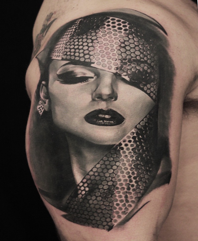 Realism style colored shoulder tattoo of seductive woman face