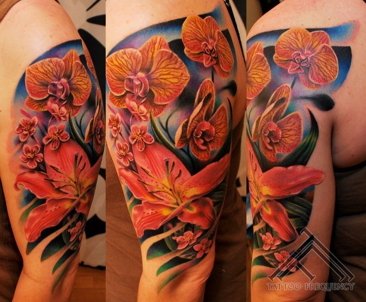 Realism style colored shoulder tattoo of various flowers