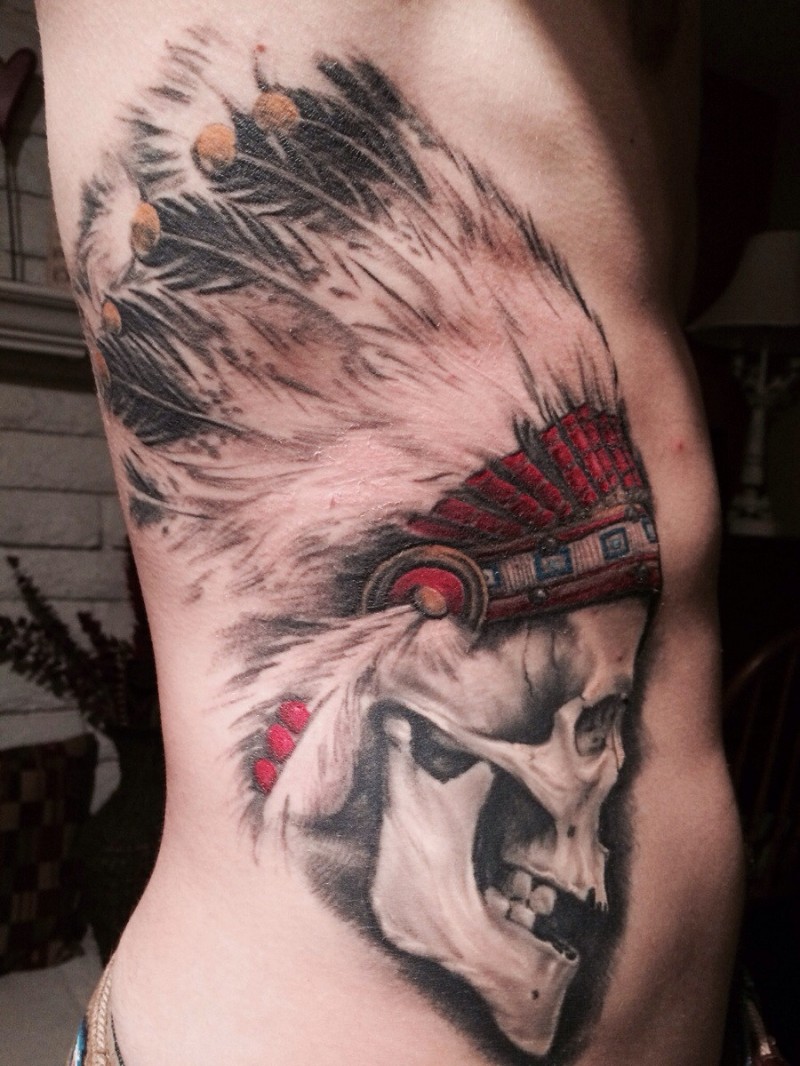 Realism style colored side tattoo of Indian skull and helmet