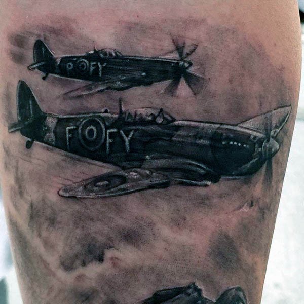 Realism style colored small leg tattoo of flying fighter planes