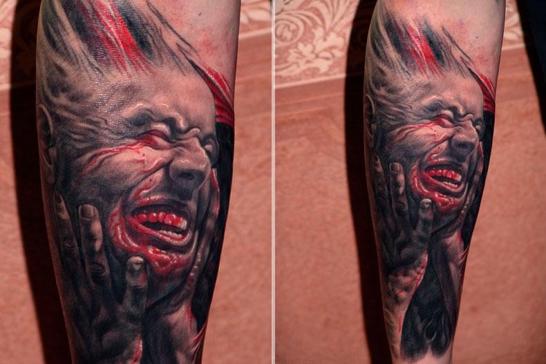 Realism style colored tattoo of bloody man face