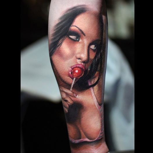 Realism style colored tattoo of sexy woman with lollipop