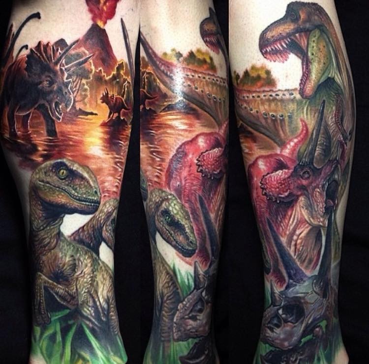 Realism style colored tattoo of various dinosaurs