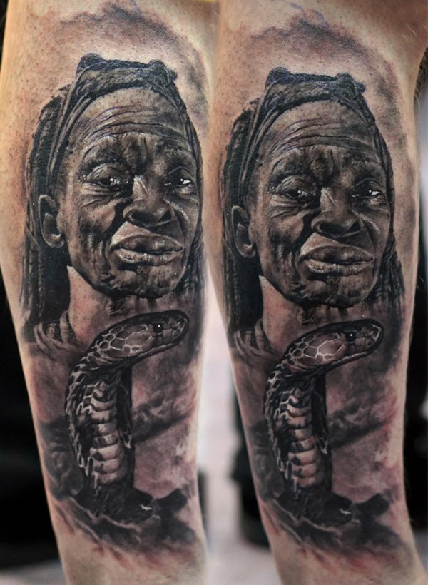 Realism style detailed arm tattoo of tribal woman with snake