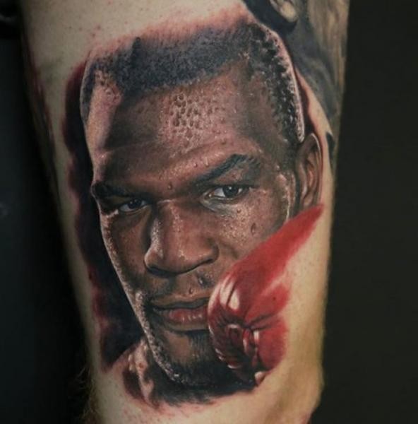 Realism style very detailed and colored Mike Tyson portrait tattoo