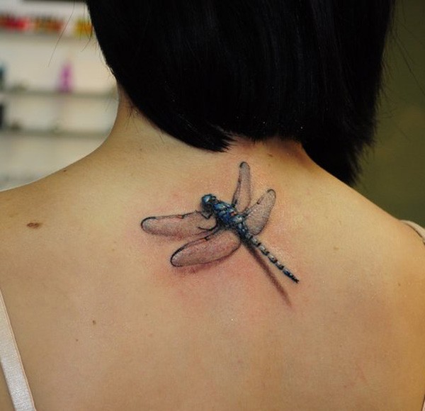Realistic dragonfly tattoo on back for girls