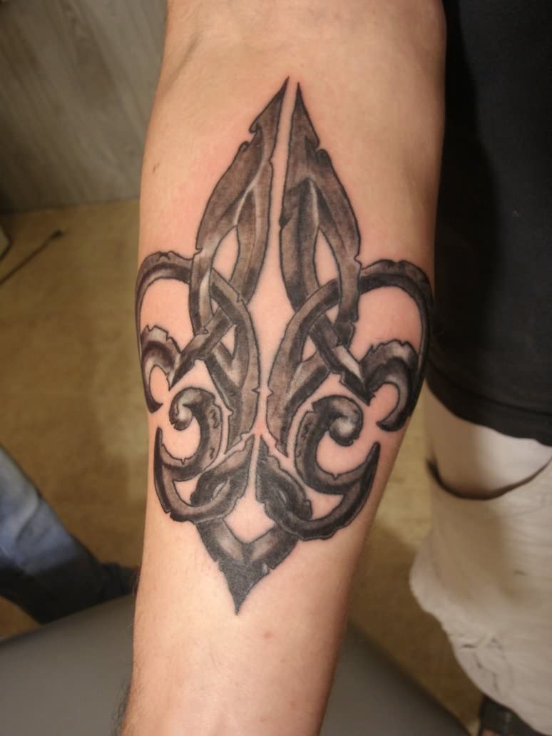 Realistic iron Fleur De Lis forearm tattoo