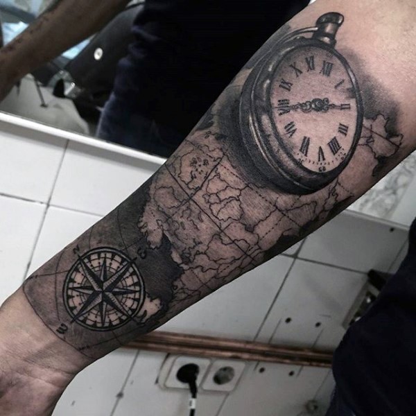 Realistic looking black ink clock with nautical world map tattoo on arm