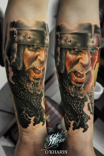 Realistic looking colored arm tattoo of medieval warrior