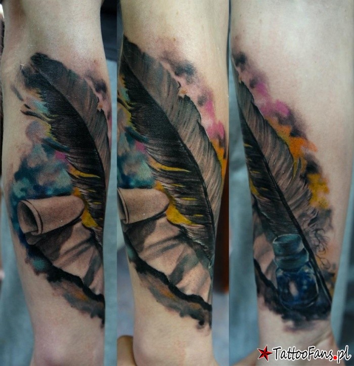 Realistic looking colored arm tattoo of paper with ink and feather