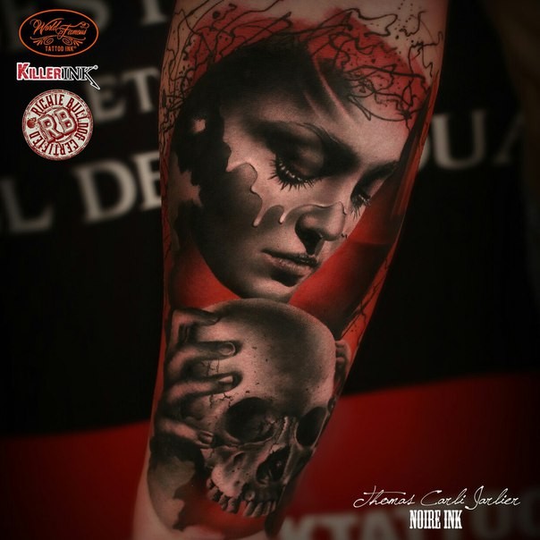 Realistic looking colored arm tattoo of woman face with skull