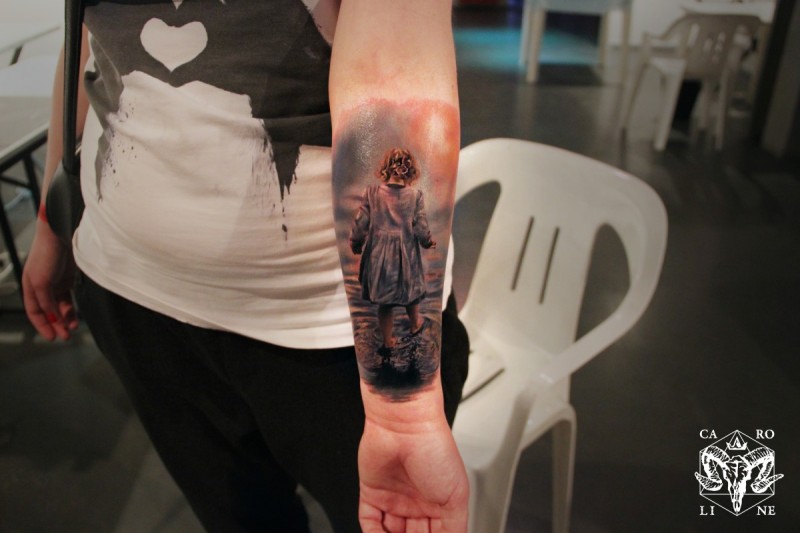 Realistic looking colored forearm tattoo
