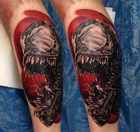 Realistic looking colored leg tattoo of creepy evil Venom