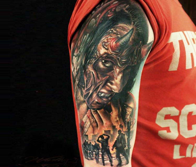 Realistic looking colored shoulder tattoo of bloody demonic woman with burning city