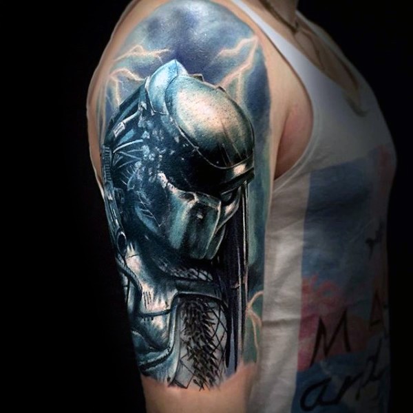 Realistic looking colored thigh tattoo of evil Predator with lightning