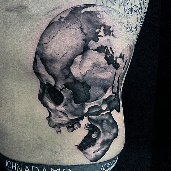 Realistic looking detailed black and white corrupted skull tattoo on side