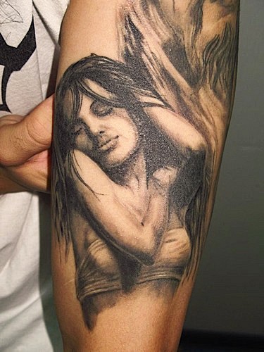 Realistic painted colored very detailed seductive woman portrait tattoo on arm area