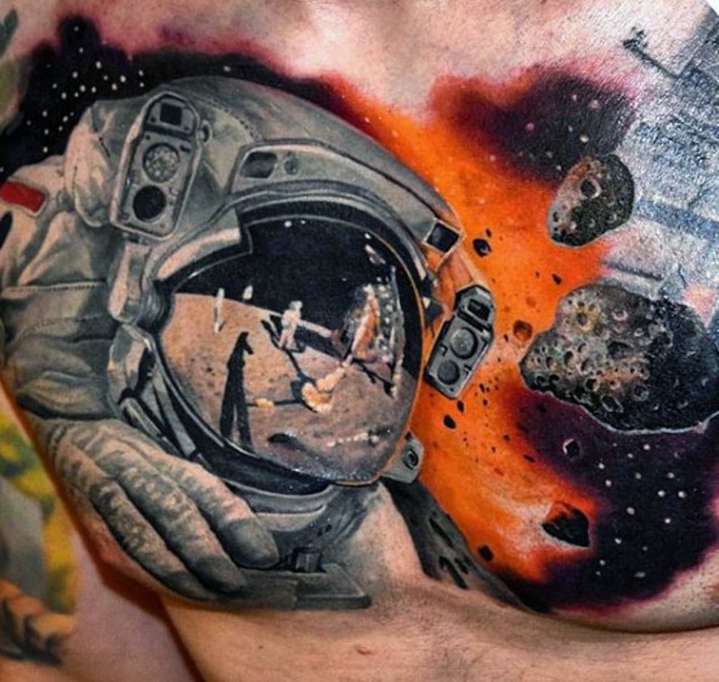 Realistic photo like colored spaceman on moon tattoo on chest