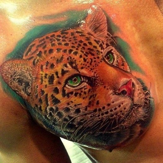 ritratto realistico di leopardo tatuaggio