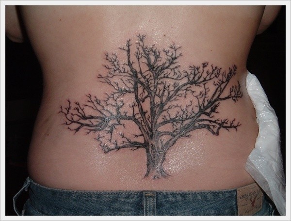 Realistic tree tattoo on lower back