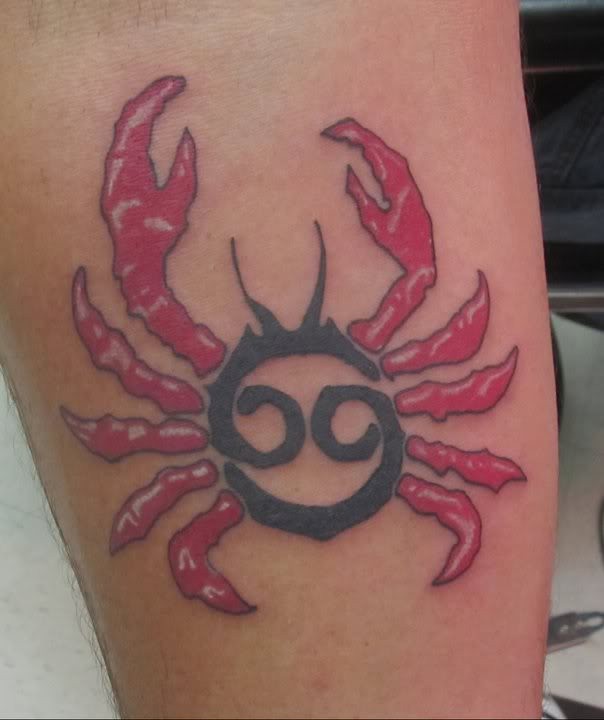 Red and black crab tattoo for lady