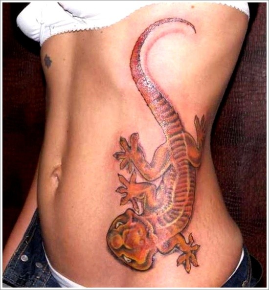 Red big lizard tattoo on ribs for women