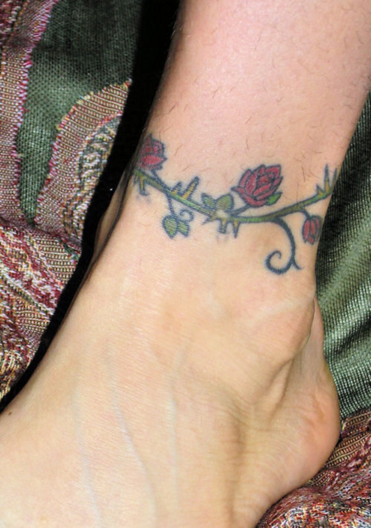 Red roses with thorns ankle bracelet tattoo
