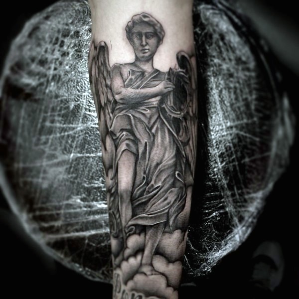 Religious style colored forearm tattoo of angel statue