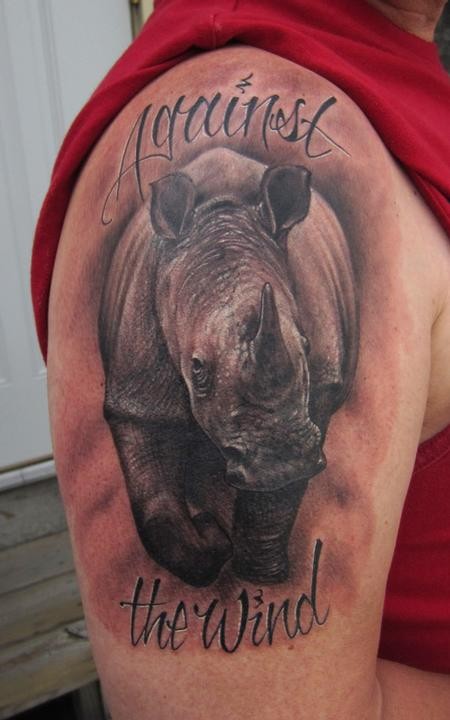 Rhino portrait arm tattoo design