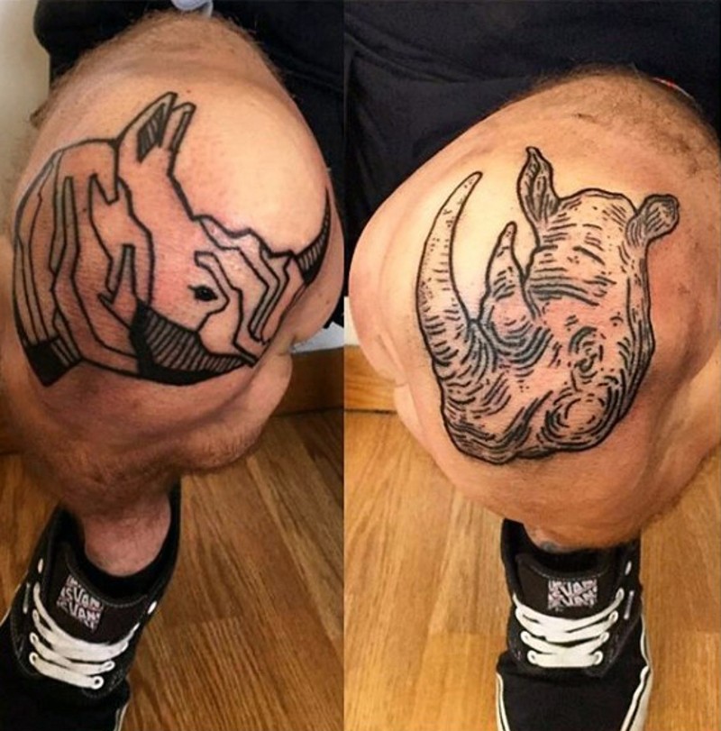 Rhinoceros' portrait black ink tattoo on knee