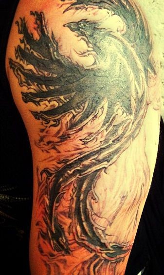 Risen from fire phoenix tattoo on half sleeve