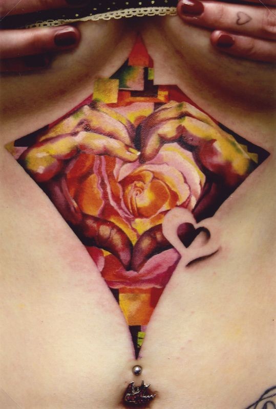 Romantic style colored rose flower with heart shaped hands tattoo on belly