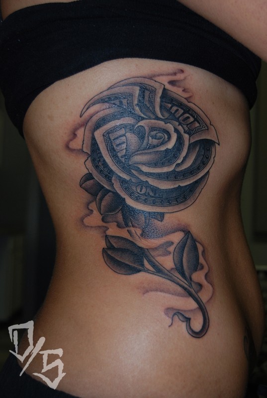 Rose flower designed with dollar banknotes side tattoo with shadow