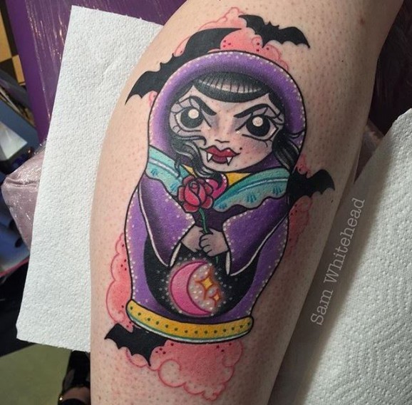Russian doll vampire with rose tattoo on leg by Sam Whitehead