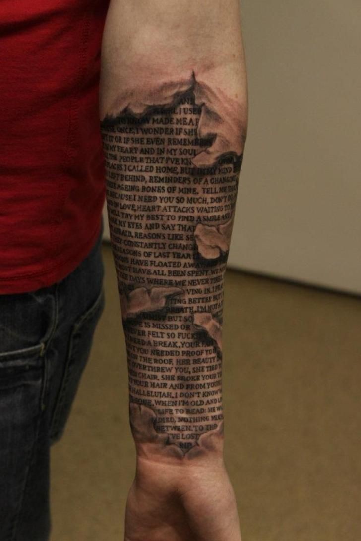 Sacred texts under skin rip forearm tattoo