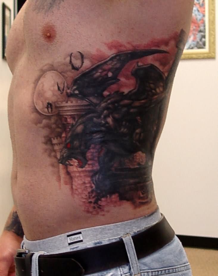 Scary gargoyle tattoo on ribs for men