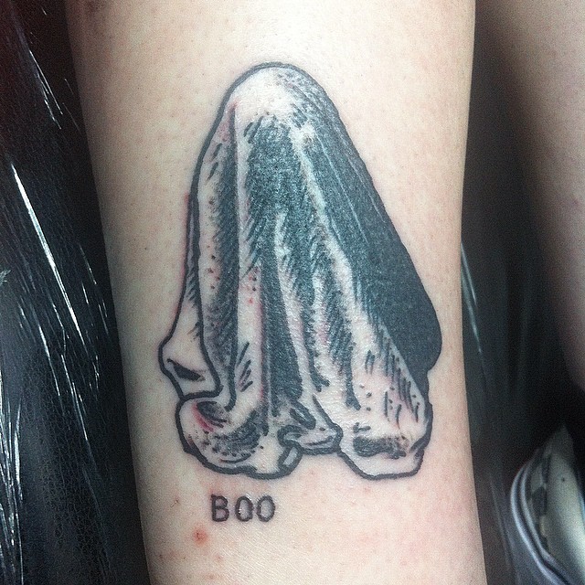 Scary ghost tattoo on arm for her