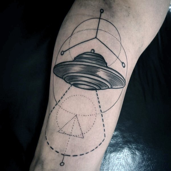 Scientific style black and white alien ship tattoo on arm